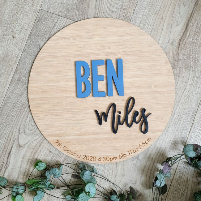 Birth details and name on bamboo circle
