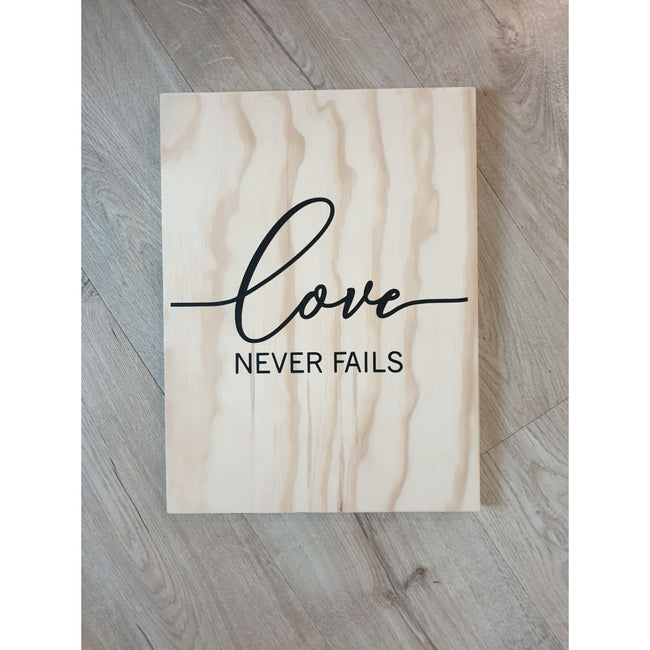 Love Never Fails Wooden Sign - Plywood Sign